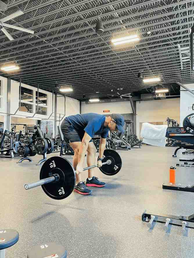 Person lifting barbell